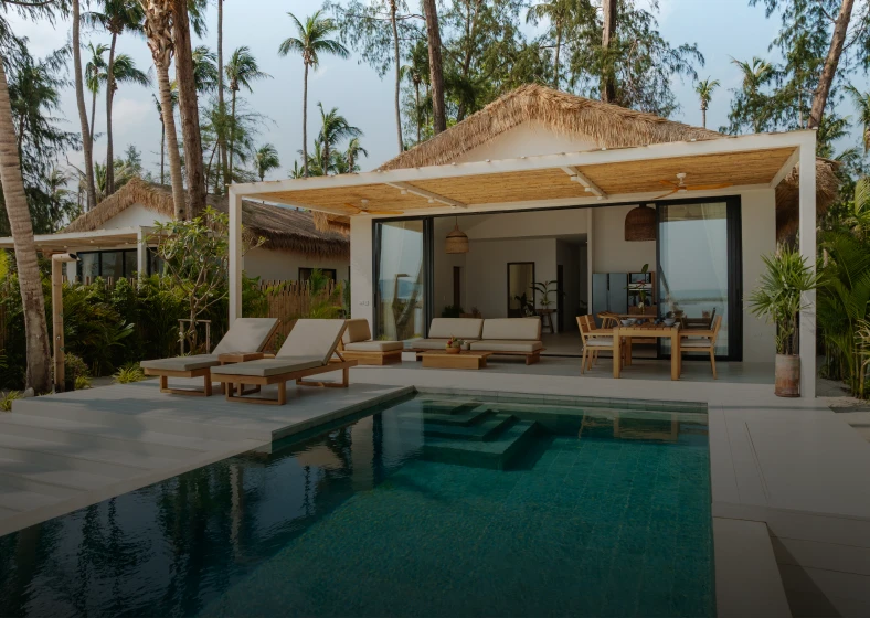 Tropical villa retreat with palm trees