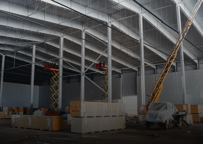 Large building under renovation with equipment